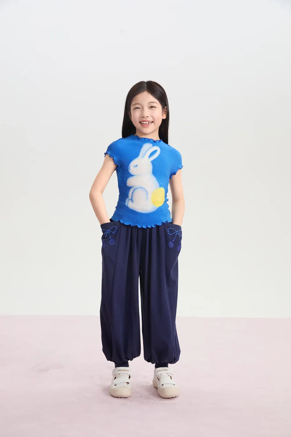 Two models wearing Poco Blush Duang-Duang tee looks