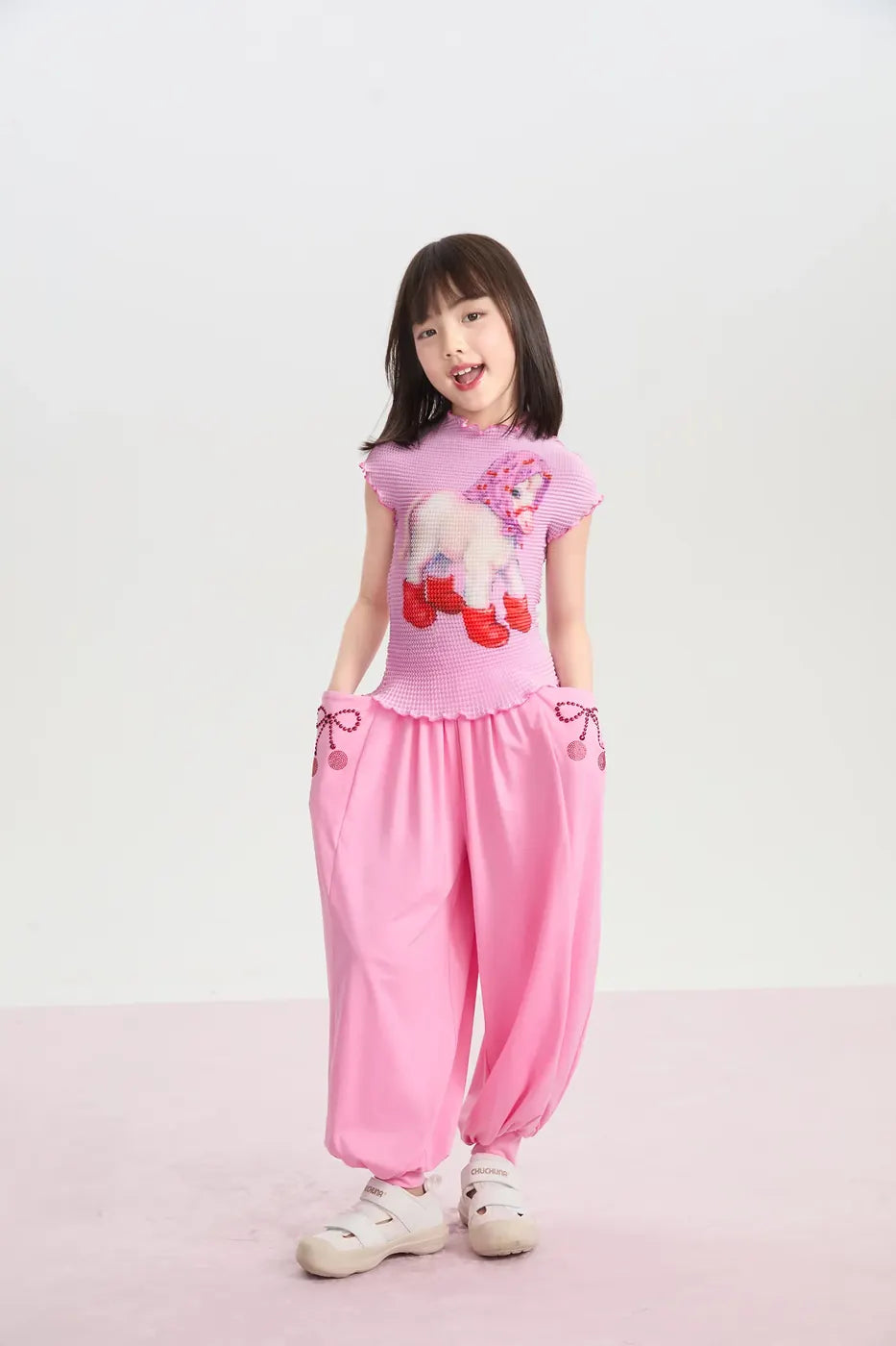 Two models in blue and pink Duang-Duang looks