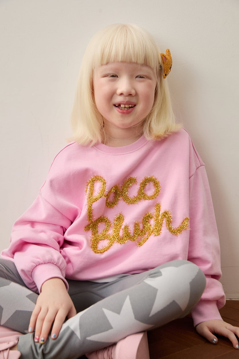 Golden Ribbon Embroidered Sweatshirt by Poco Blush — hero view 1