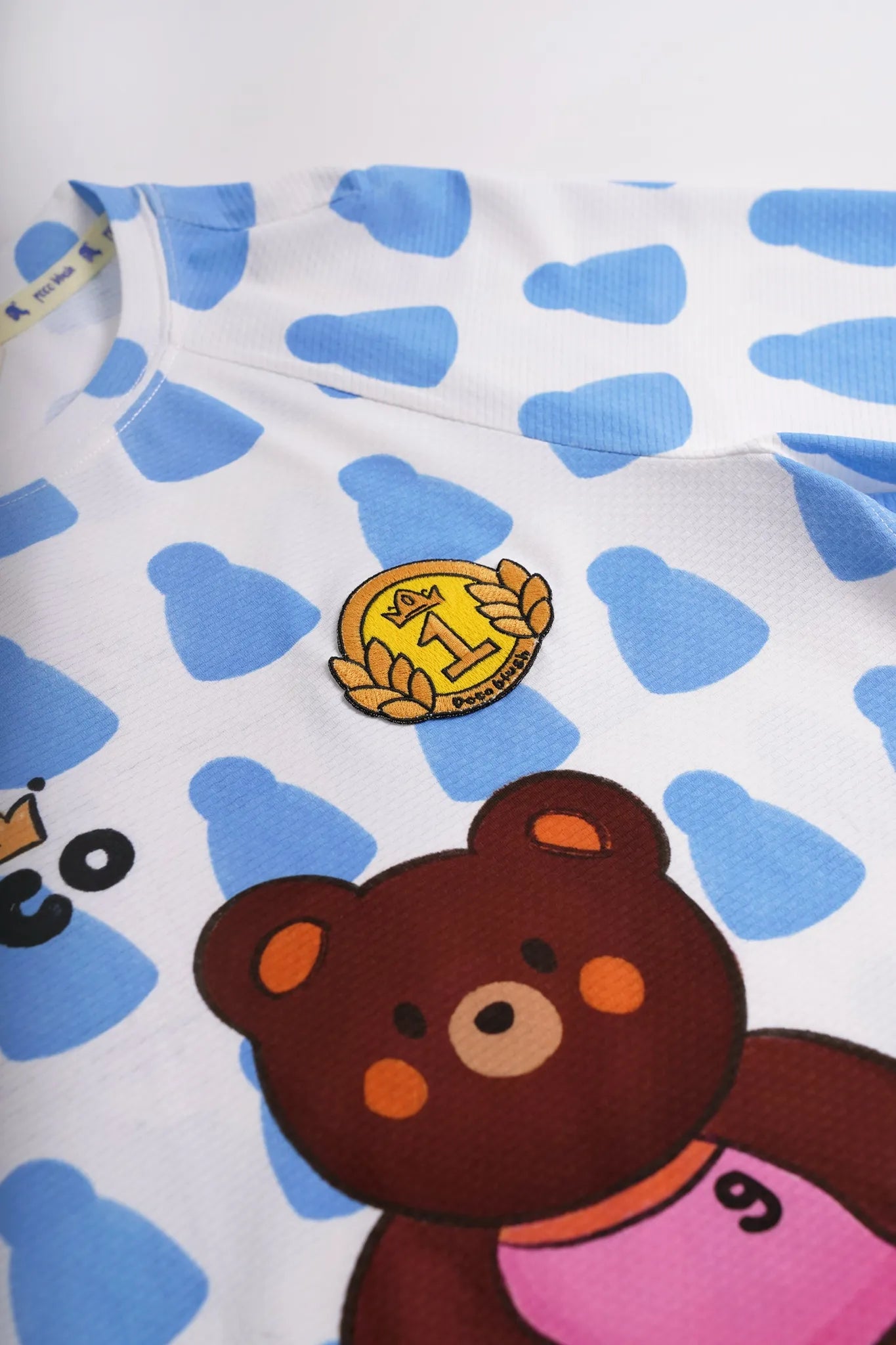 Poco Blush Football Bear UPF 50+ Sports Tee