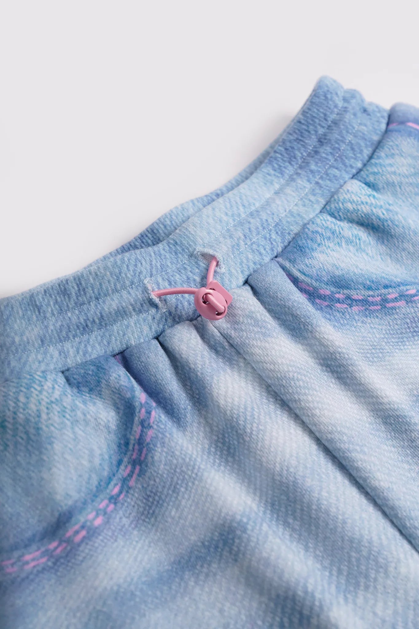 Poco Blush Denim Joggers with Wing Print
