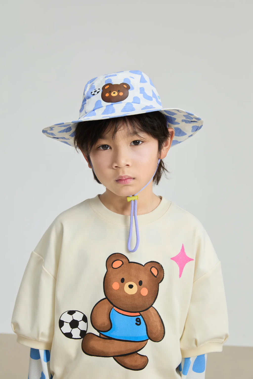 Poco Blush Football Bear Wide‑Brim Bucket Hat