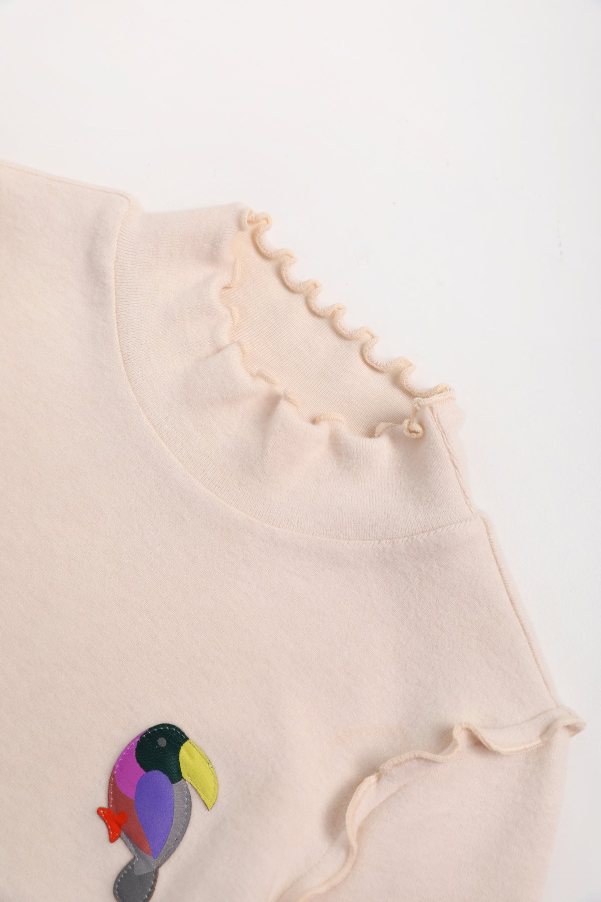 Ink-Wash Frill-Neck Base-Layer Top — Cream White; construction and decoration detail