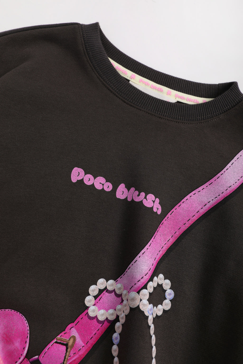 Ink-Wash Printed Pocket Sweatshirt — Ink Black; construction and decoration detail