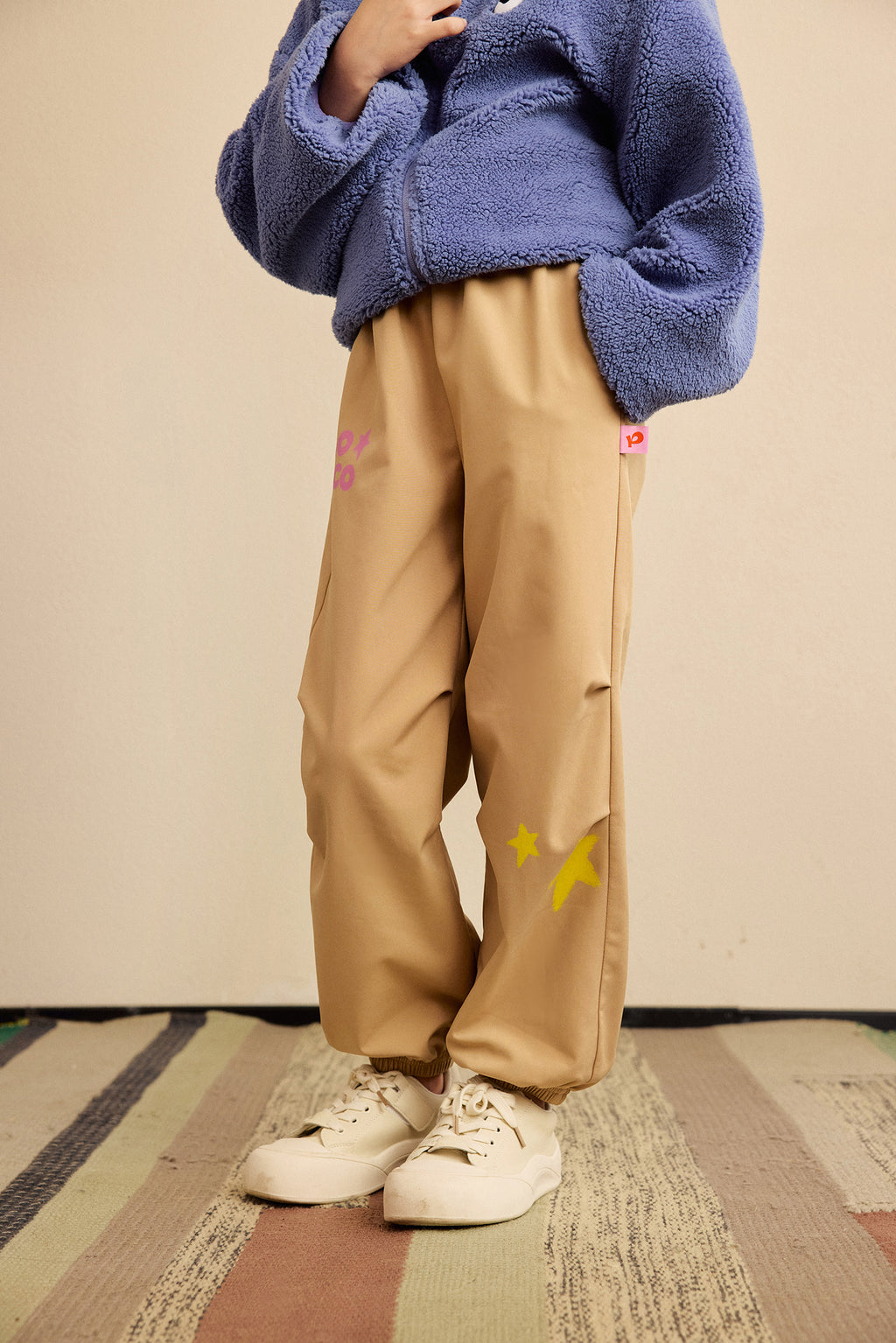 Ink-Wash Fleece-Backed Trousers — Soft Ochre; worn view; other styled garments and accessories are not included