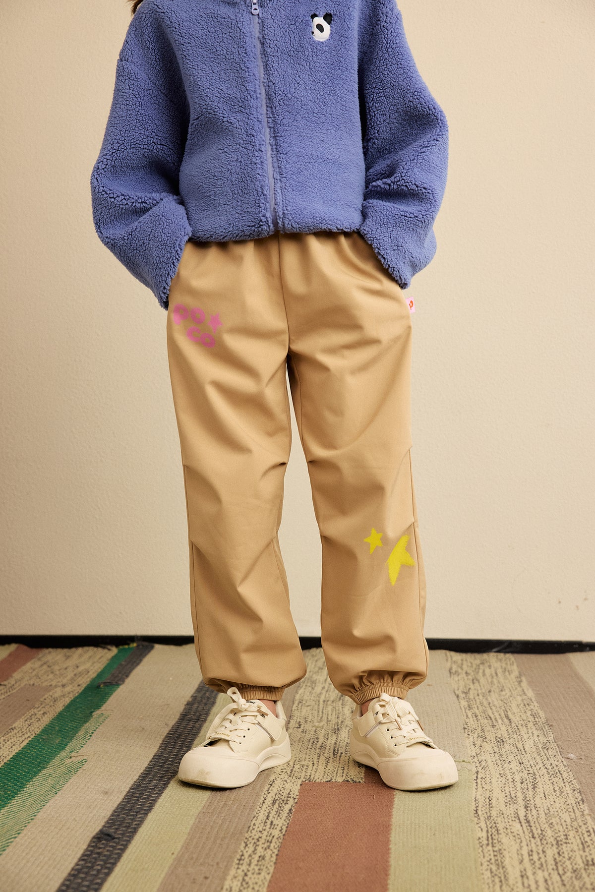 Ink-Wash Fleece-Backed Trousers — Soft Ochre; worn view; other styled garments and accessories are not included