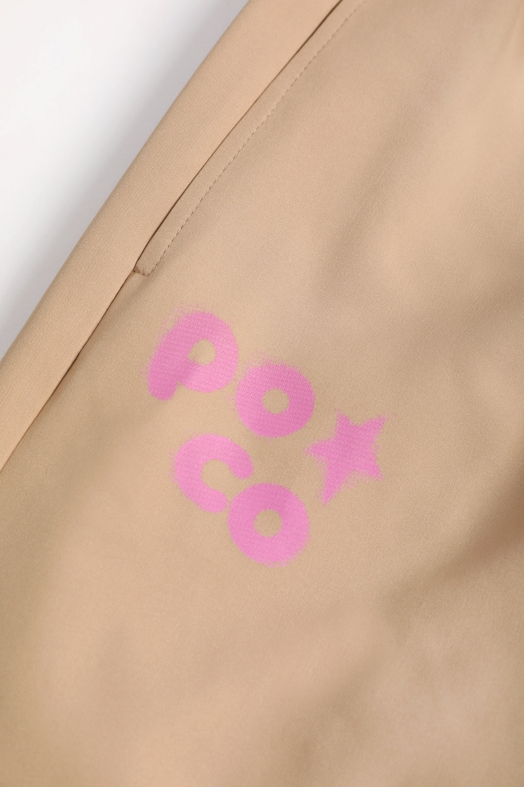 Ink-Wash Fleece-Backed Trousers — Soft Ochre; construction and decoration detail