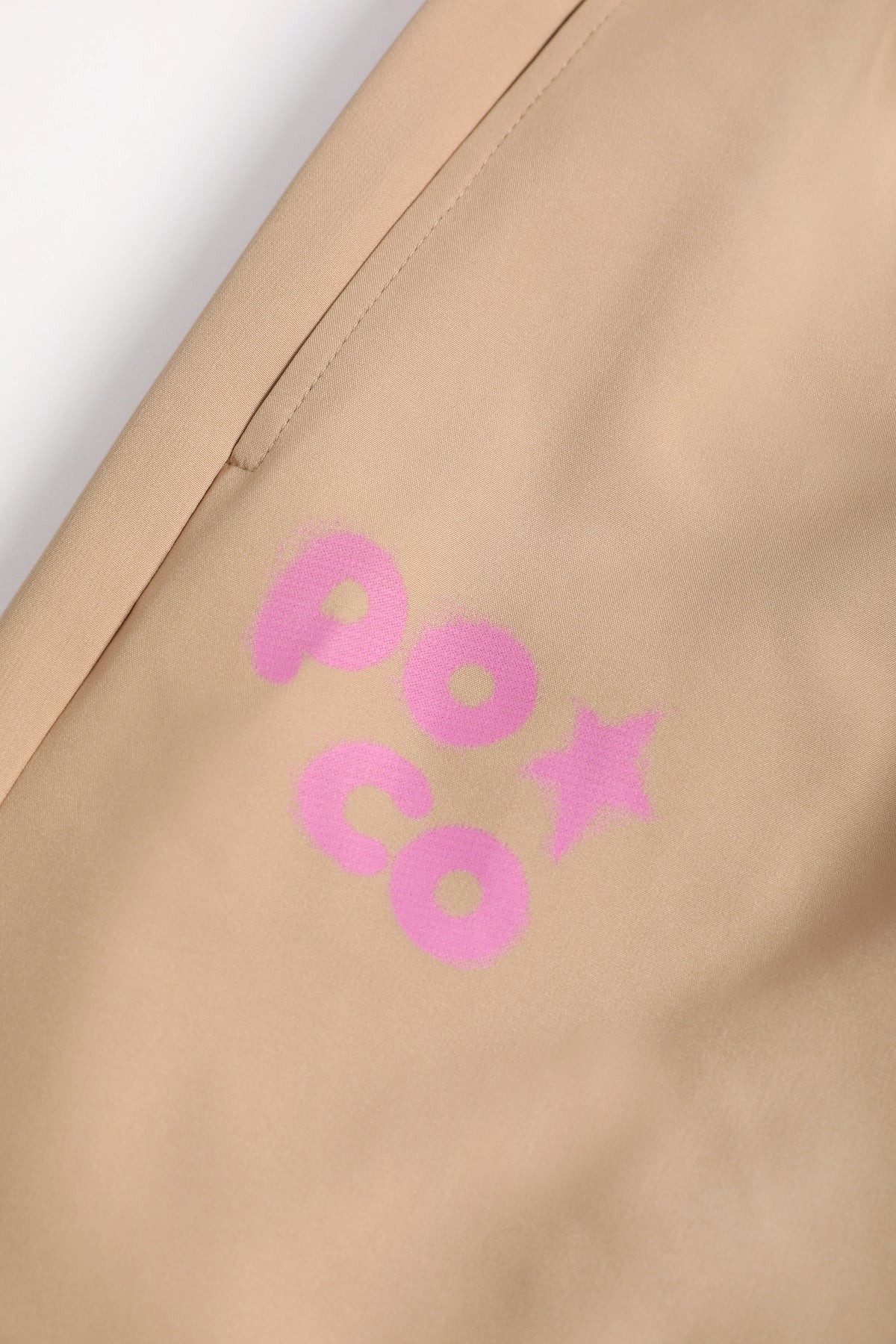 Ink-Wash Fleece-Backed Trousers — Soft Ochre; construction and decoration detail
