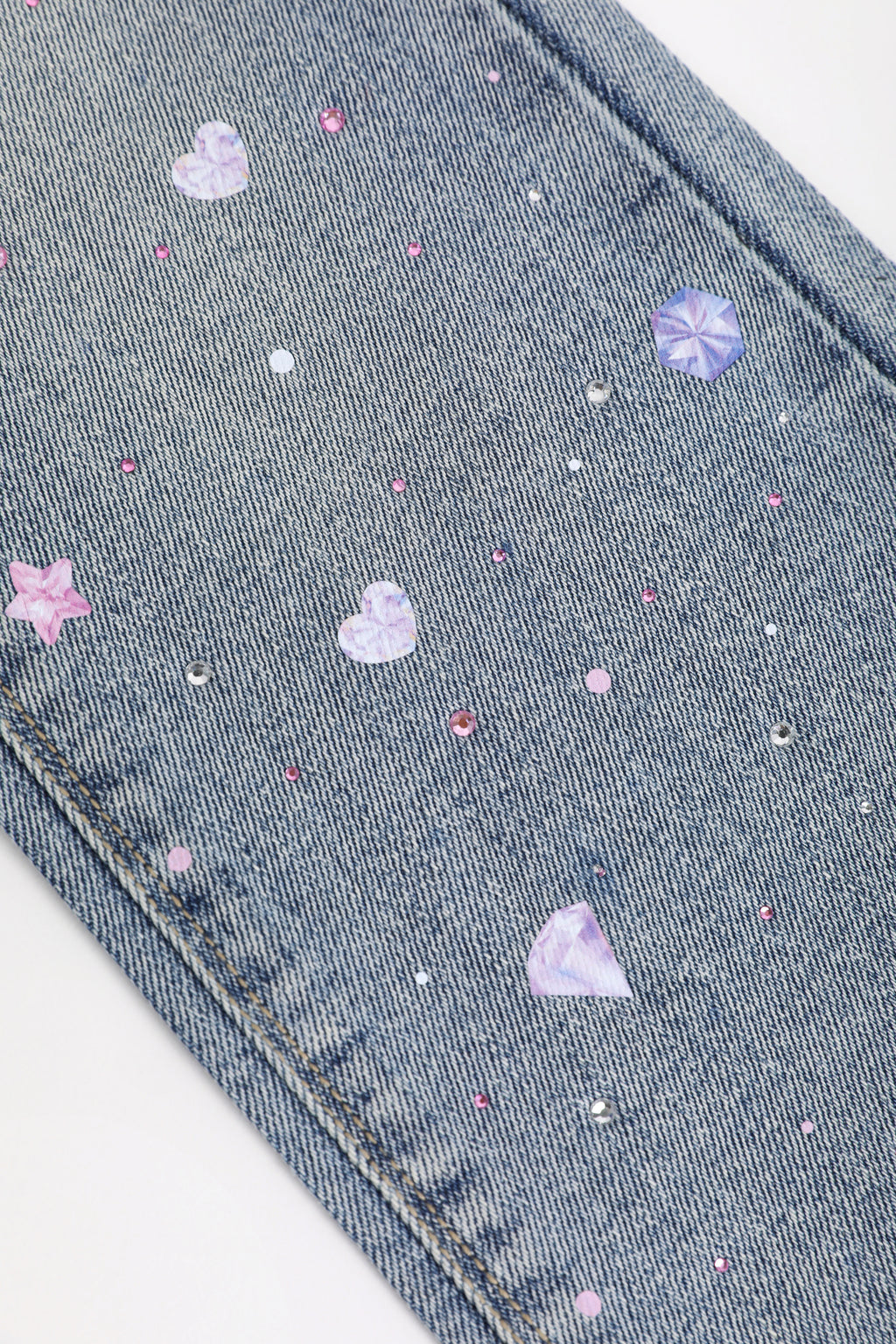 Crystal-Print Flared Jeans — Denim Blue; construction and decoration detail