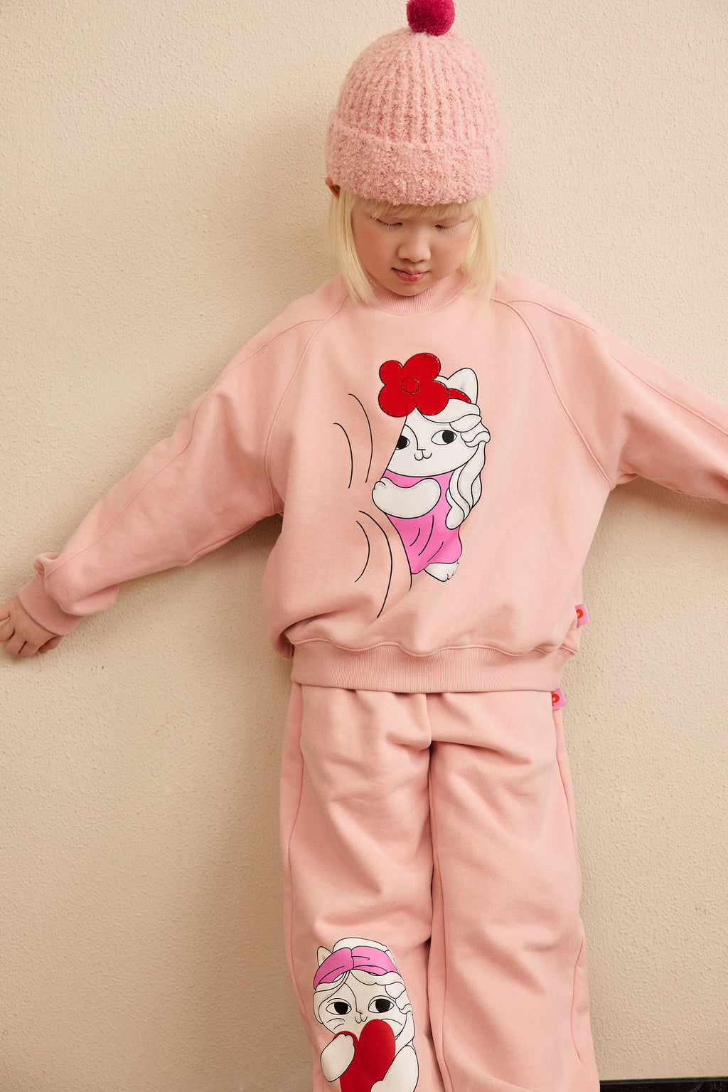 Hide-and-Seek Cat Sweatshirt — Dusty Pink; worn view; other styled garments and accessories are not included