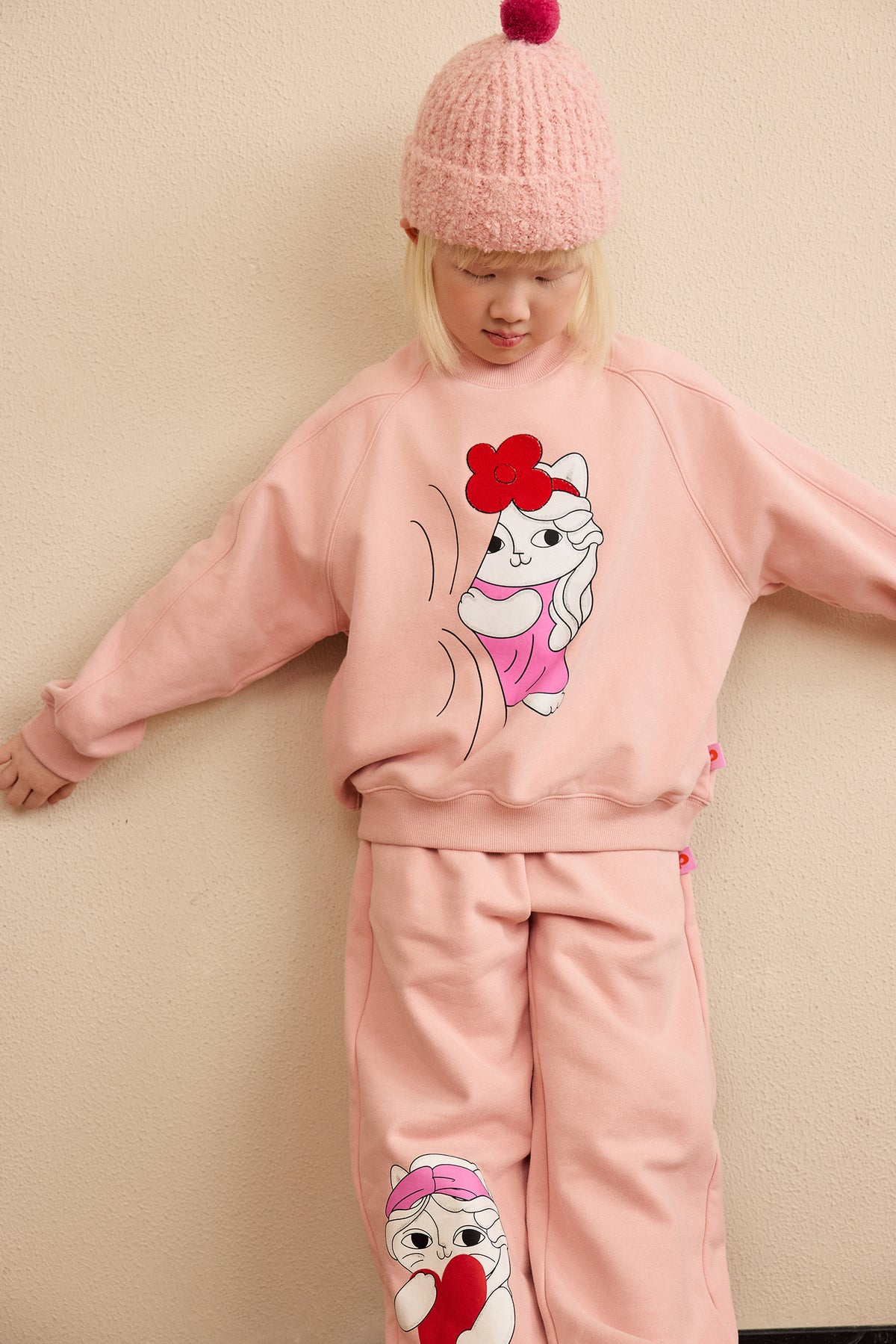 Hide-and-Seek Cat Sweatshirt — Dusty Pink; worn view; other styled garments and accessories are not included