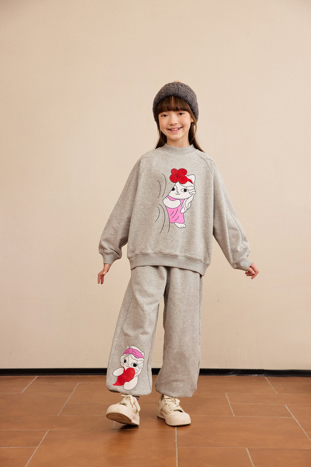 Hide-and-Seek Cat Joggers — Pencil Grey; worn view; other styled garments and accessories are not included