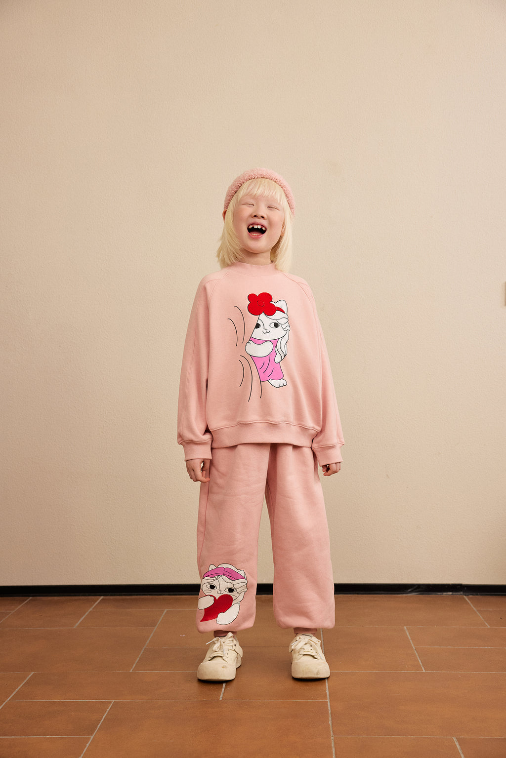 Hide-and-Seek Cat Joggers — Dusty Pink; worn view; other styled garments and accessories are not included