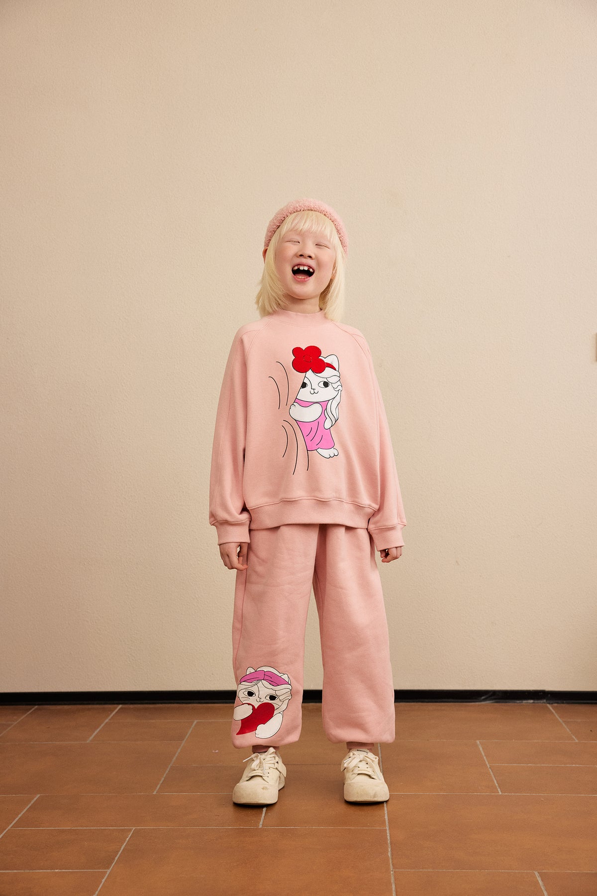 Hide-and-Seek Cat Joggers — Dusty Pink; worn view; other styled garments and accessories are not included