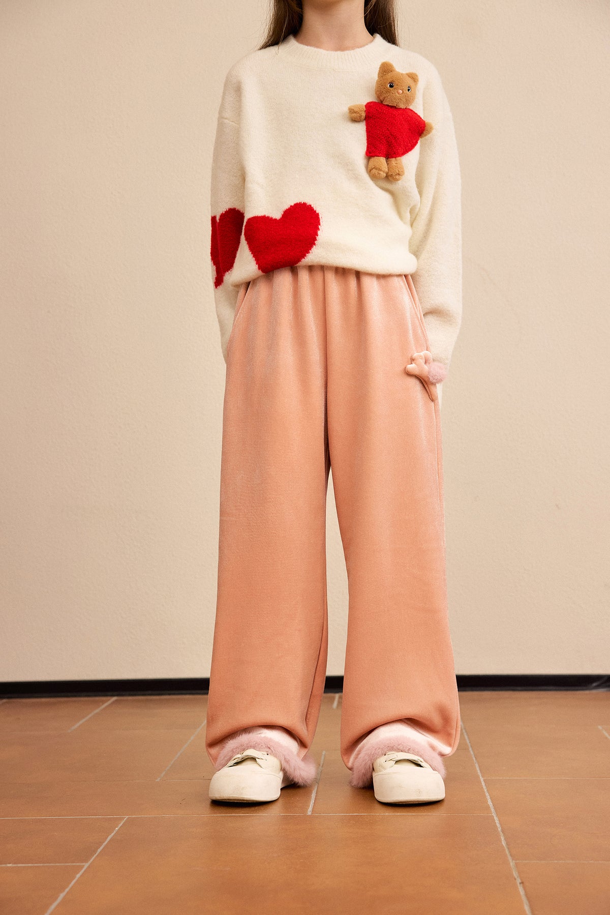 Moon Rabbit Velvet Trousers — Dusty Pink; worn view; other styled garments and accessories are not included