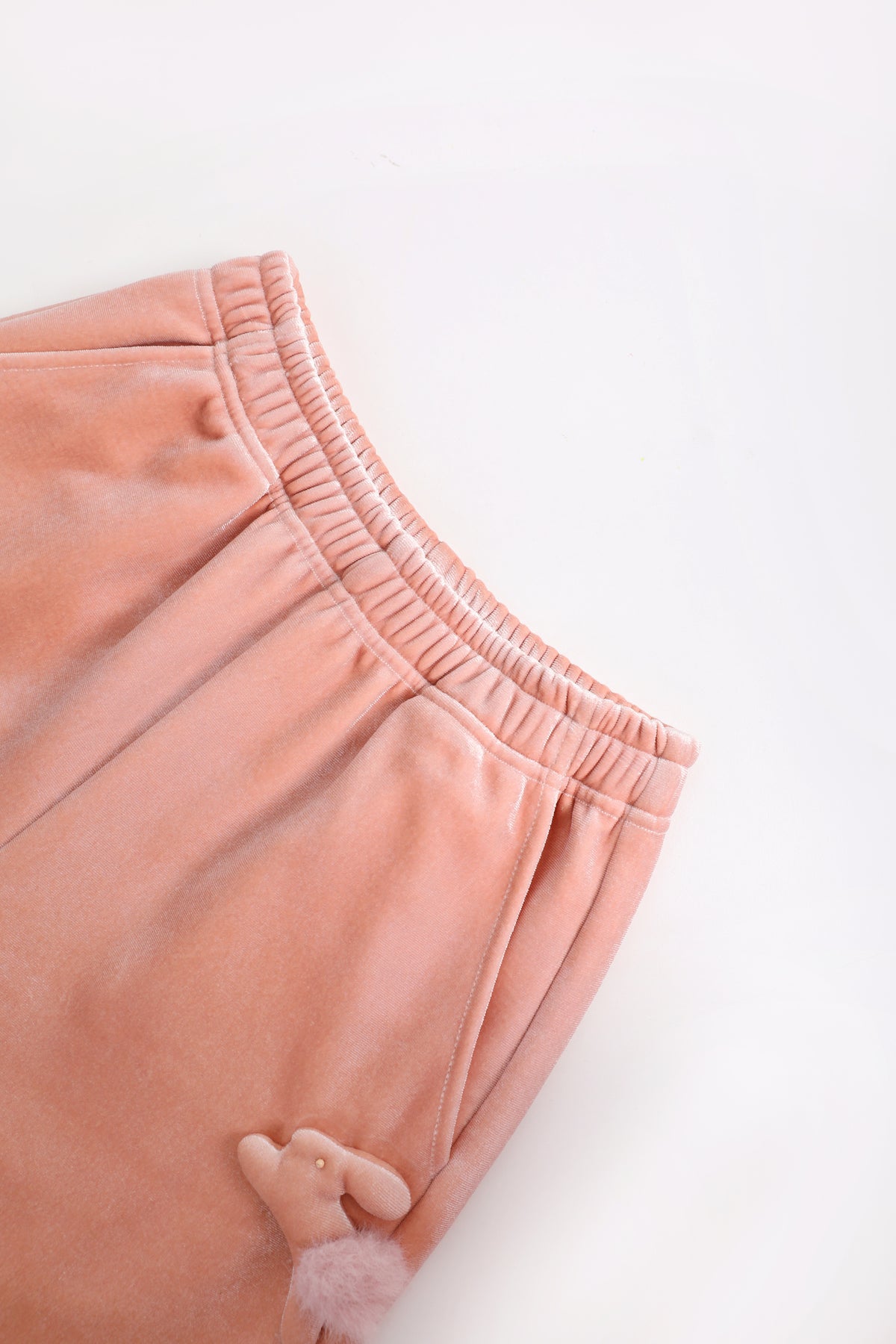 Moon Rabbit Velvet Trousers — Dusty Pink; construction and decoration detail