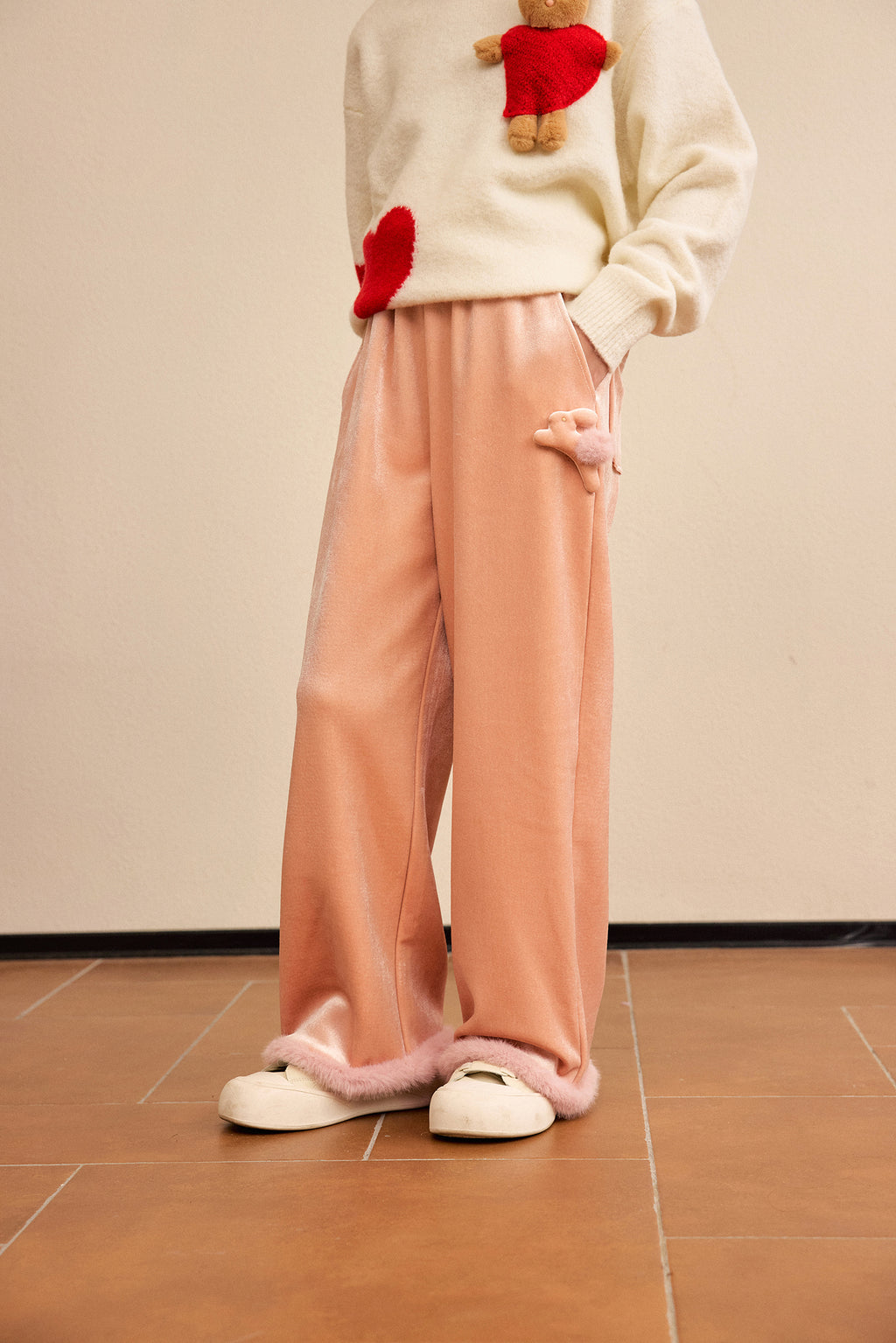 Moon Rabbit Velvet Trousers — Dusty Pink; worn view; other styled garments and accessories are not included