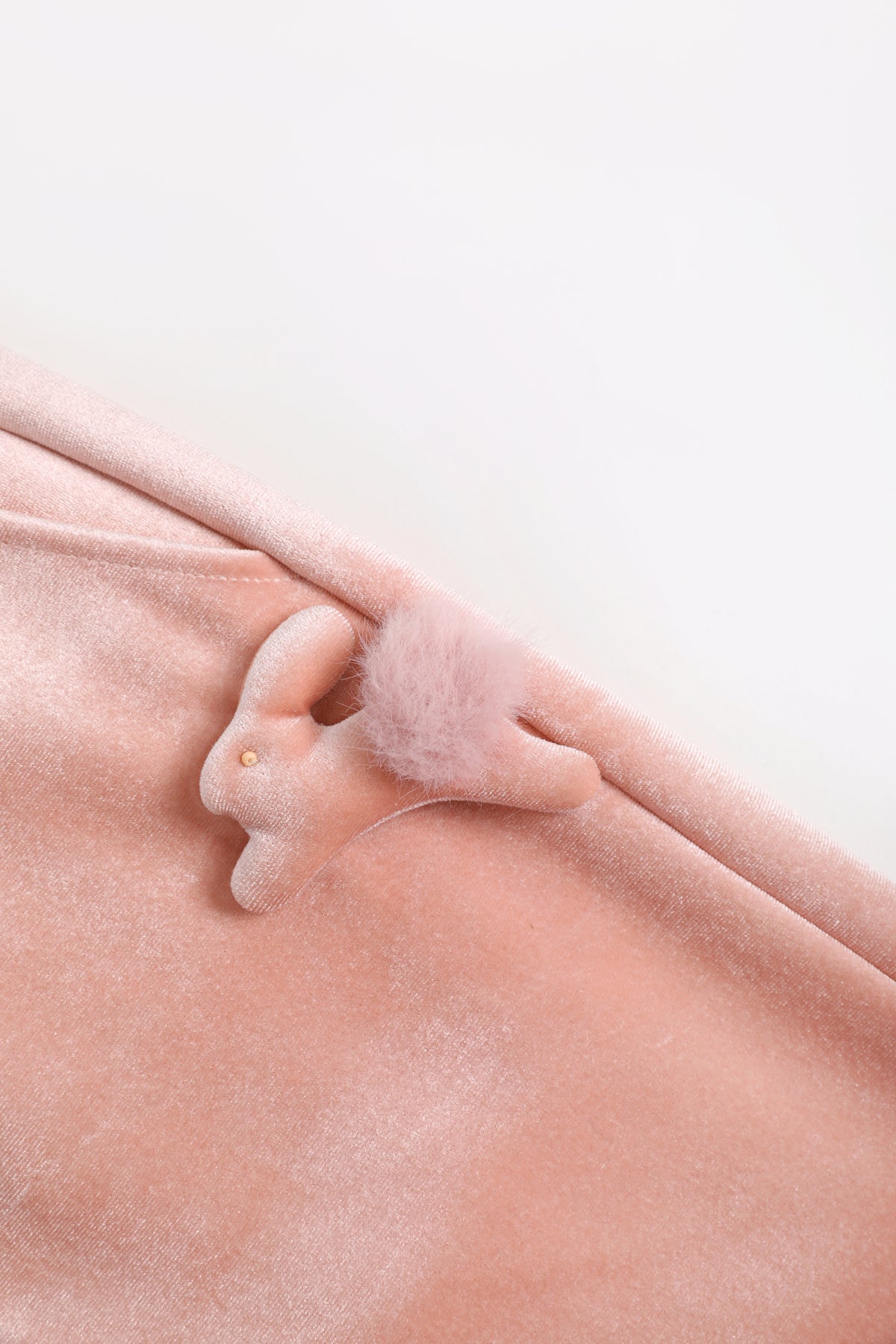 Moon Rabbit Velvet Trousers — Dusty Pink; construction and decoration detail