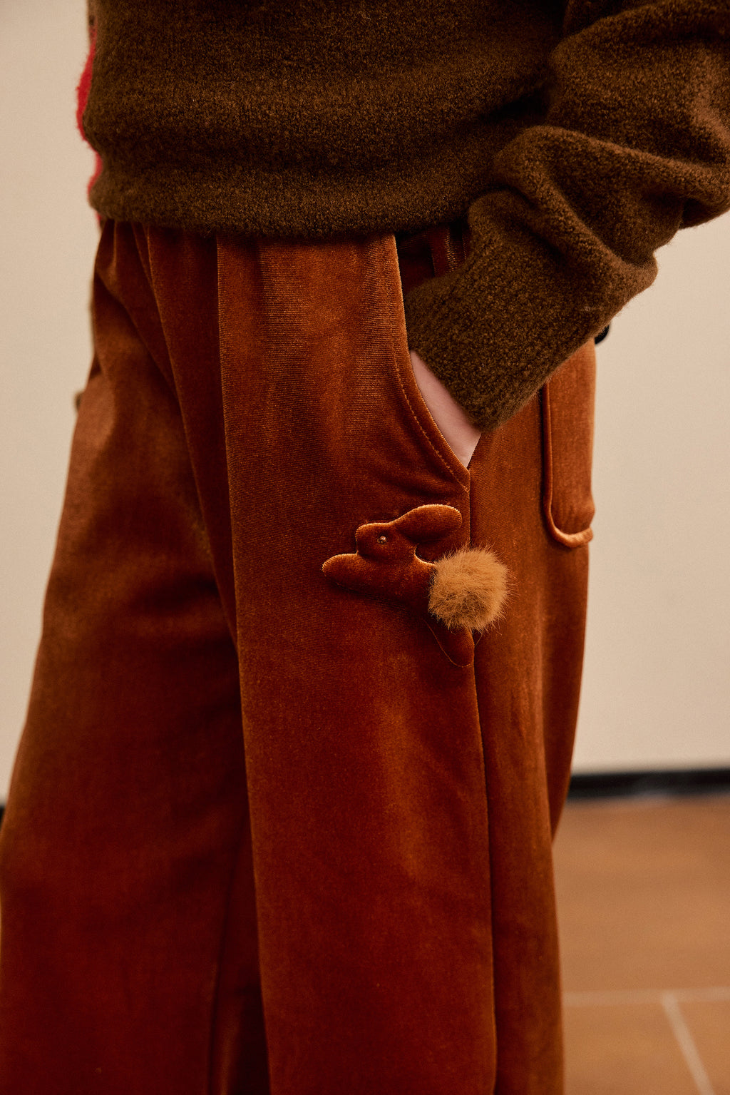 Moon Rabbit Velvet Trousers — Caramel Brown; worn view; other styled garments and accessories are not included