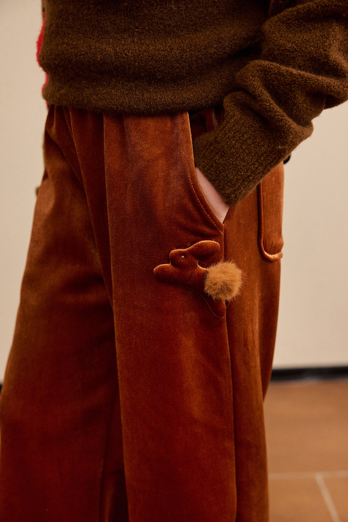 Moon Rabbit Velvet Trousers — Caramel Brown; worn view; other styled garments and accessories are not included