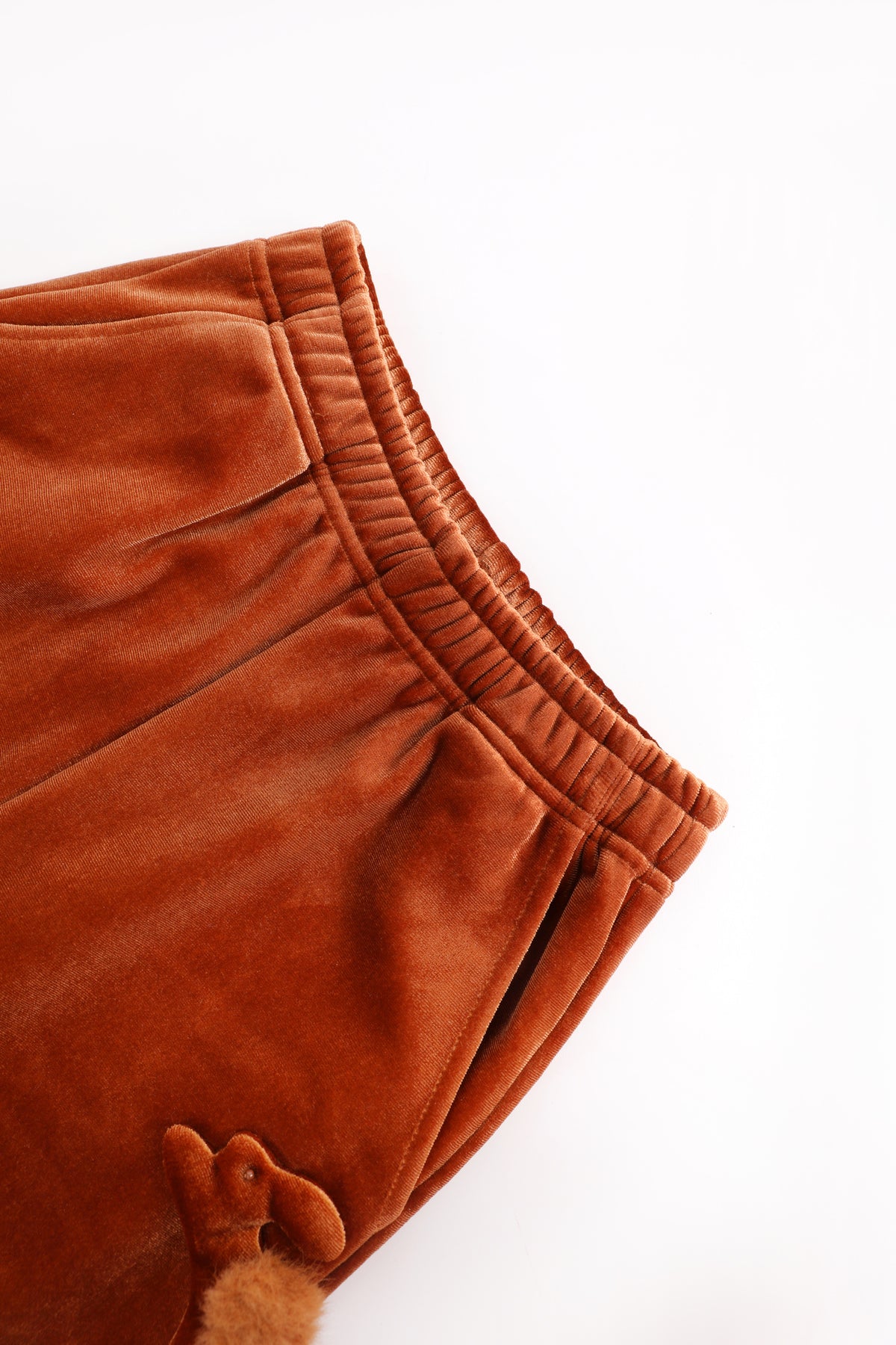 Moon Rabbit Velvet Trousers — Caramel Brown; construction and decoration detail