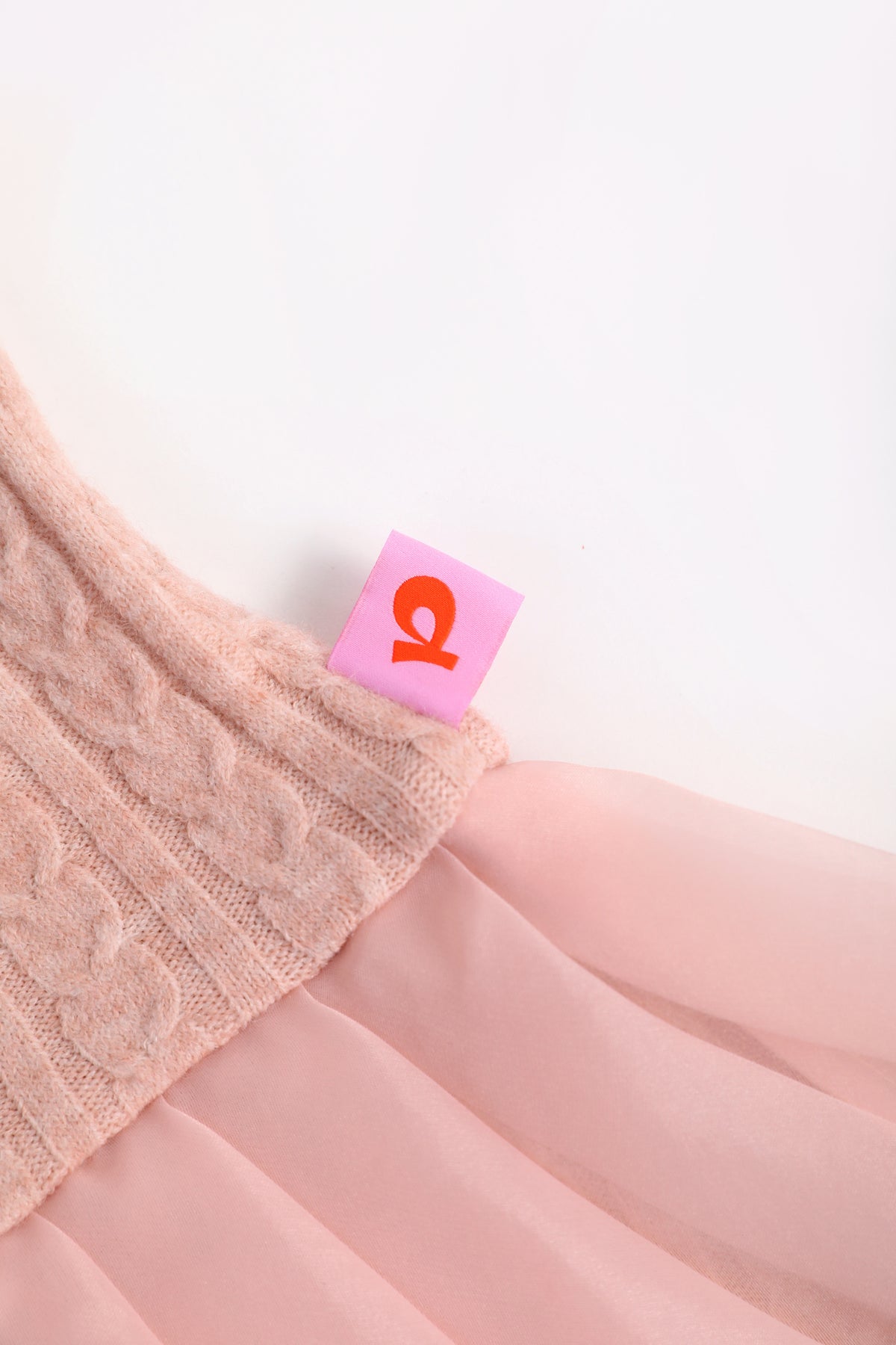 Cat-Story Pleated Organza Knit Skirt — Dusty Pink; construction and decoration detail