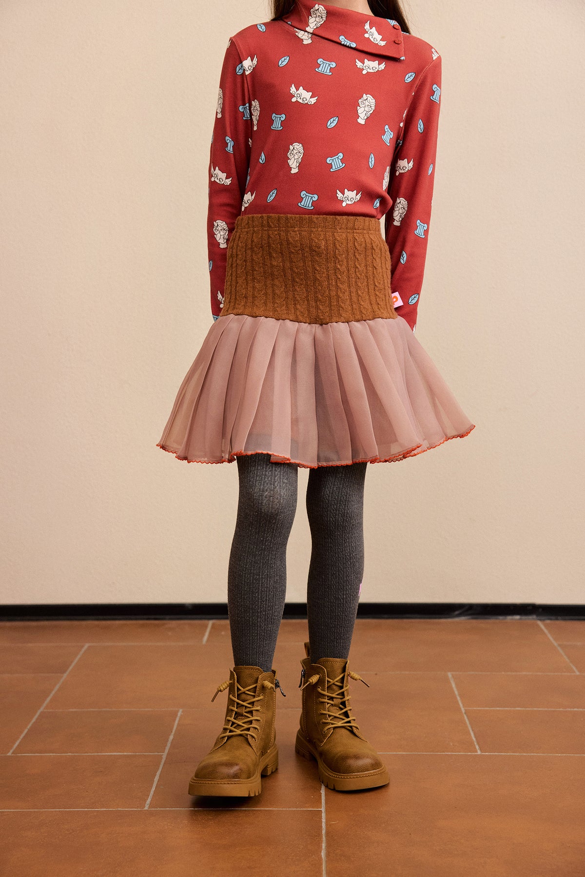 Cat-Story Pleated Organza Knit Skirt — Chestnut Brown; worn view; other styled garments and accessories are not included