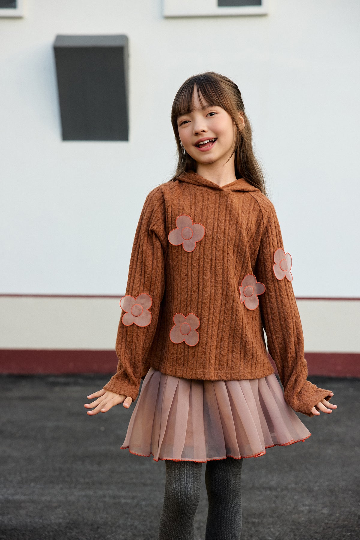 Cat-Story Pleated Organza Knit Skirt — Chestnut Brown; worn view; other styled garments and accessories are not included