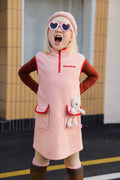 Ink-Wash Animal-Pocket Fleece Pinafore — Dusty Pink; worn view; other styled garments and accessories are not included