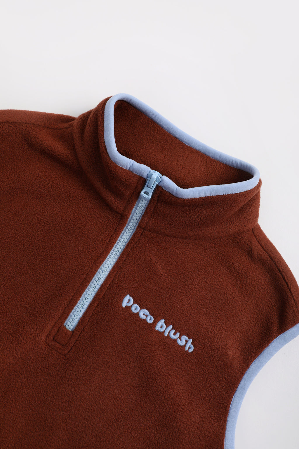 Ink-Wash Animal-Pocket Fleece Pinafore — Caramel Brown; construction and decoration detail