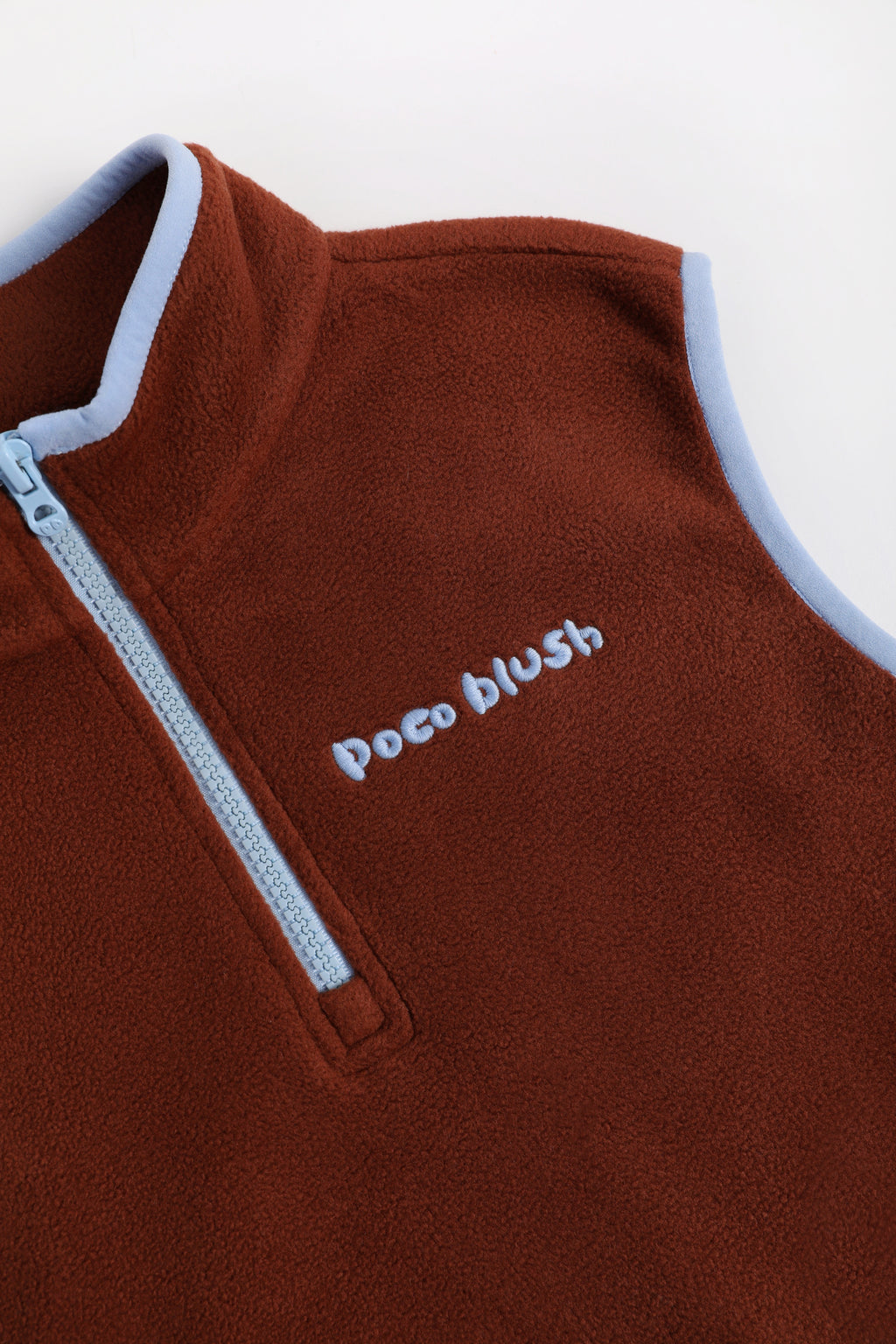 Ink-Wash Animal-Pocket Fleece Pinafore — Caramel Brown; construction and decoration detail
