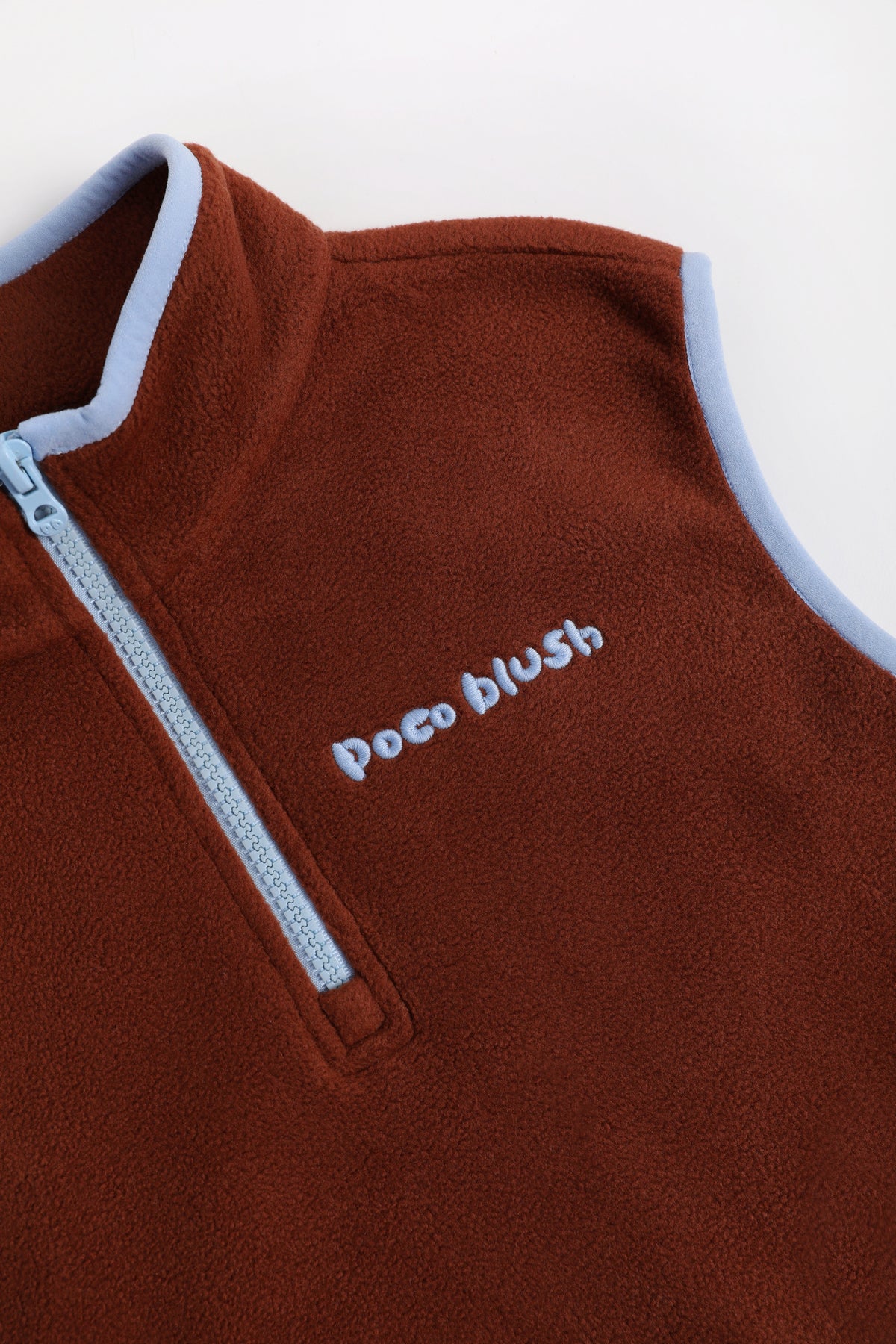 Ink-Wash Animal-Pocket Fleece Pinafore — Caramel Brown; construction and decoration detail