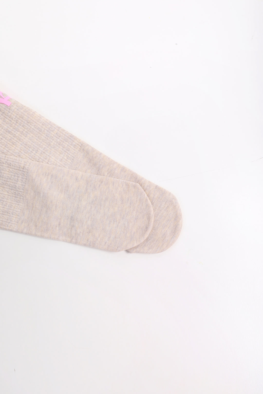 Fleece-Feel Knit Tights — Cheese Yellow; construction and decoration detail