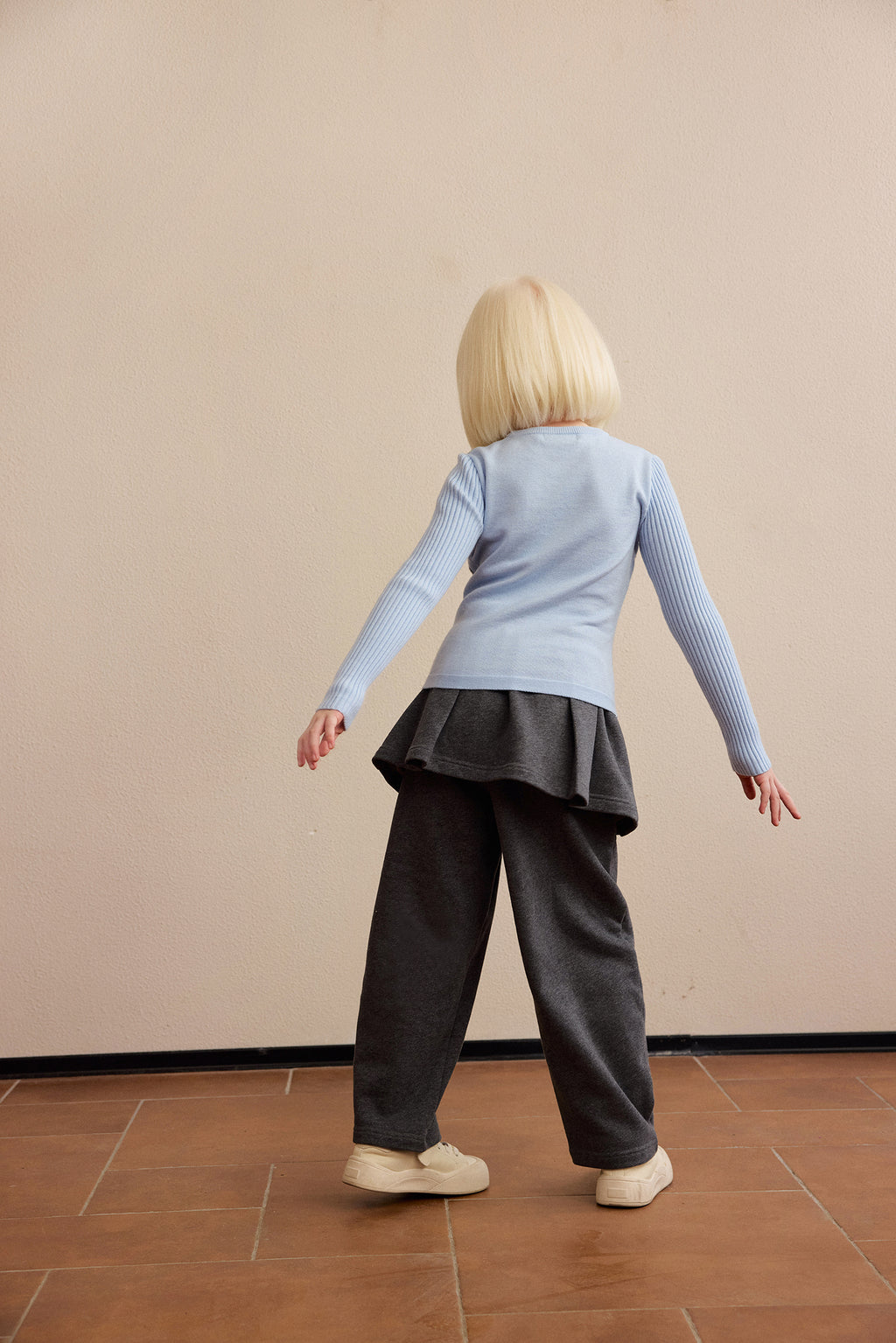 Ink-Wash Layered-Look Sweater in Blue — Sky Blue; worn view; other styled garments and accessories are not included