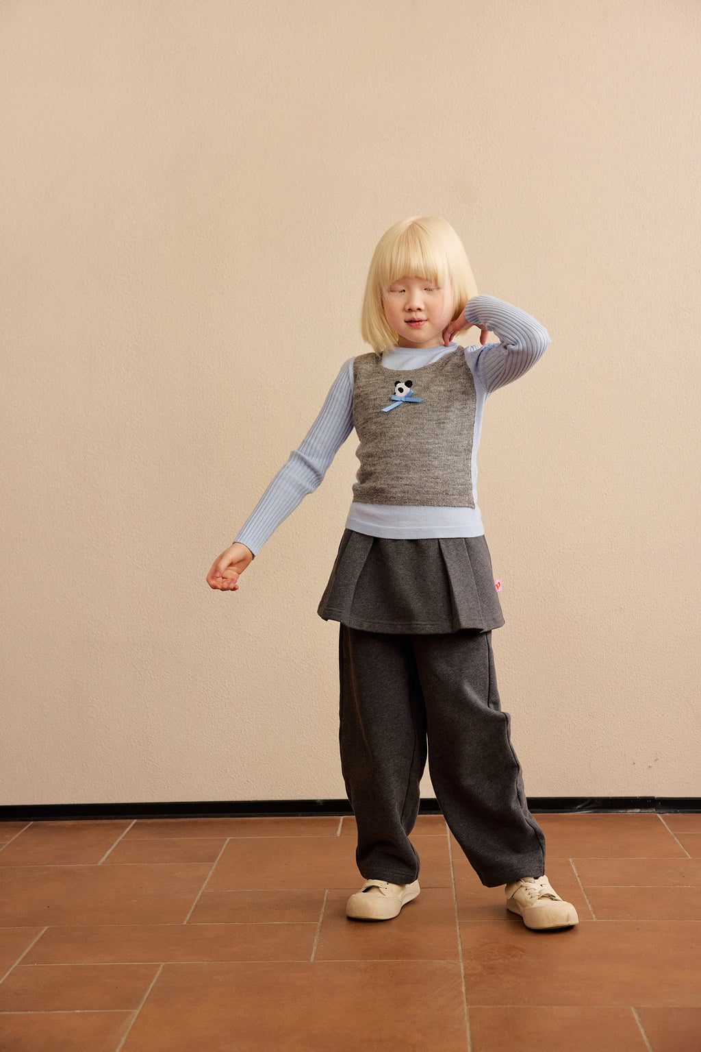 Ink-Wash Layered-Look Sweater in Blue — Sky Blue; worn view; other styled garments and accessories are not included