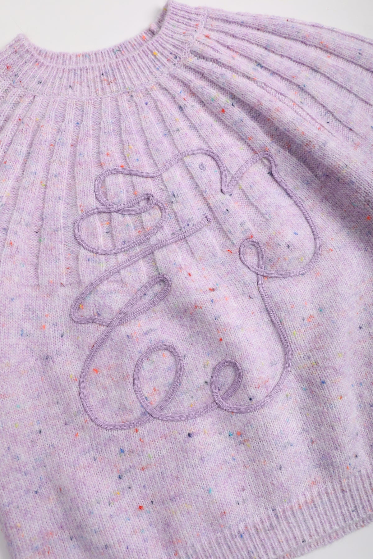Moon Rabbit Cord-Embroidered Sweater — Taro Purple; construction and decoration detail