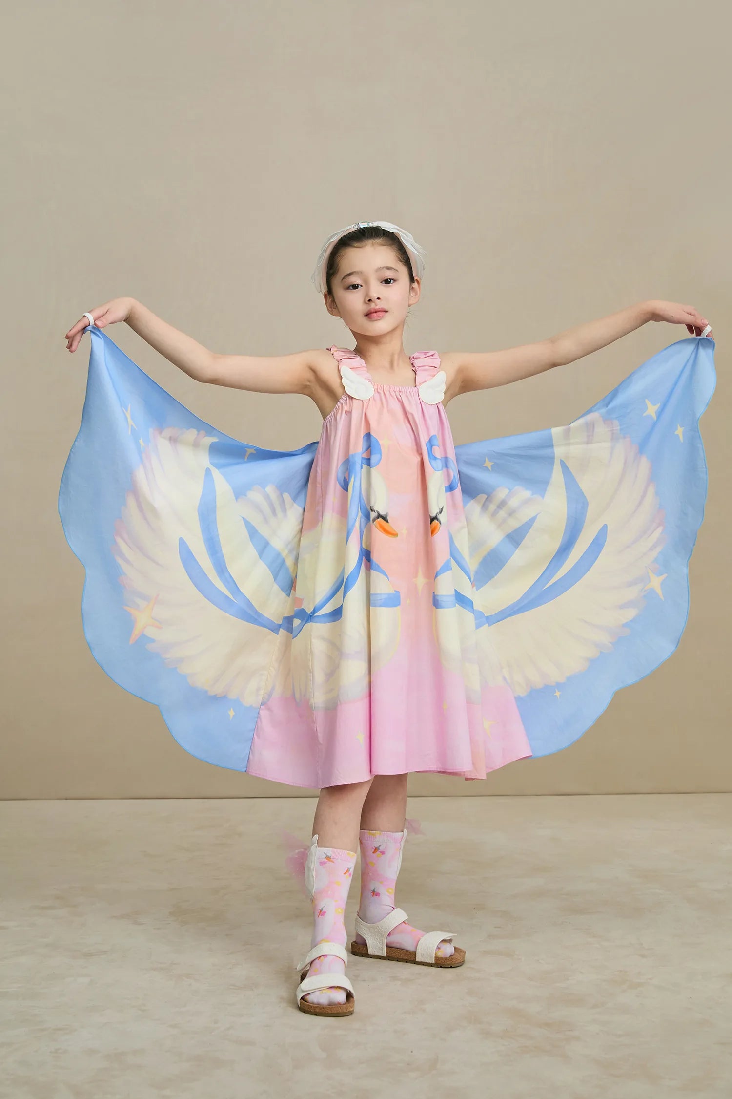 Poco Blush Swan Wing Art Print Dress — playful kids clothing for girls